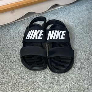 Black Nike Velcro sandals (woman’s 10)